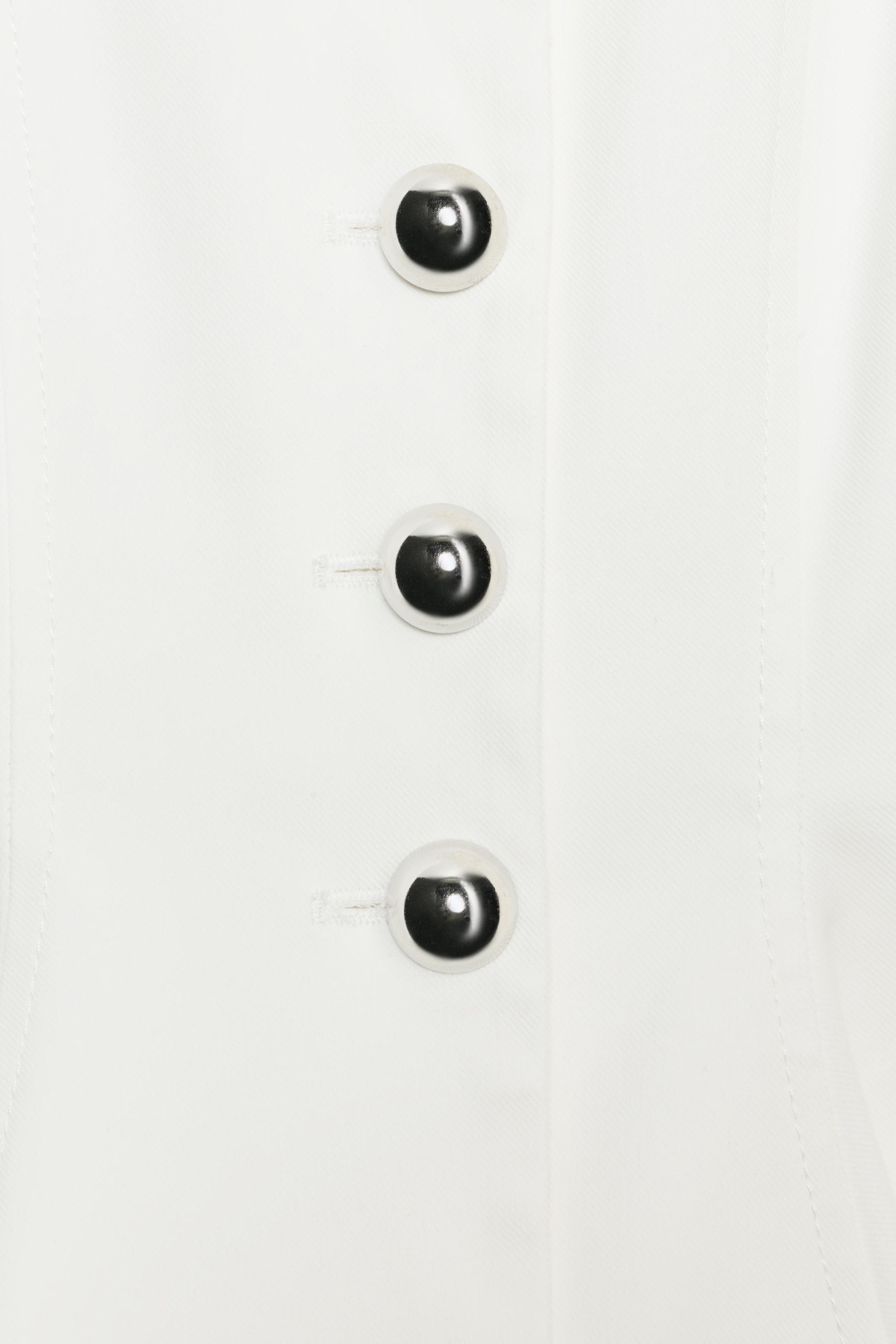 VESTE PEPLUM BOUTONS MÉTALLIQUES